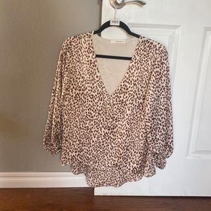 Caramela print blouse, never worn. Lined and high quality
